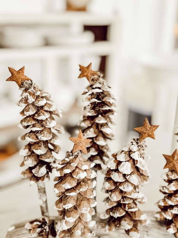 Pinecone Christmas Tree Centerpiece with whimiscal pinecones and foraged materials.  