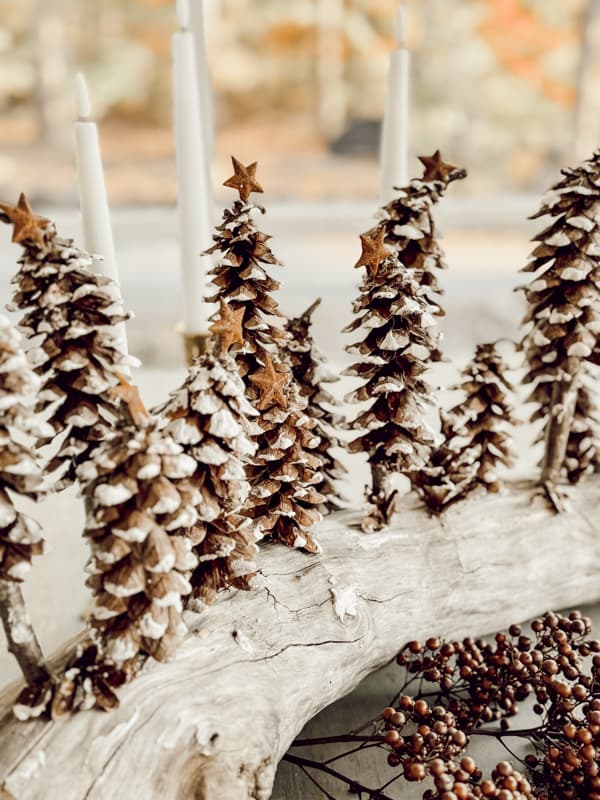 Pinecone Christmas Tree Centerpiece with whimiscal pinecones and foraged materials.