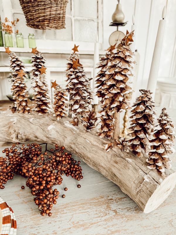 Pinecone Christmas Tree Centerpiece with whimiscal pinecones and foraged materials.