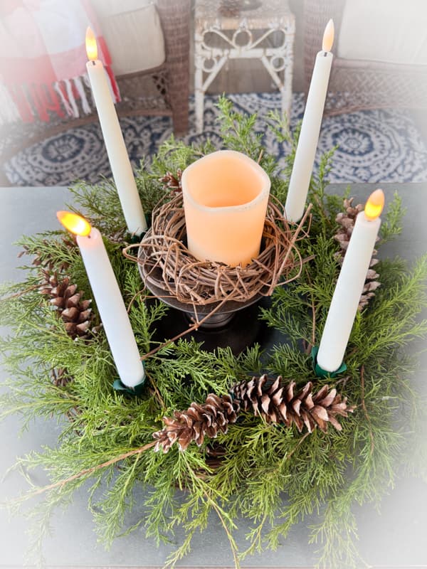 DIY Advent Wreath with flicker candles on screen porch coffee table