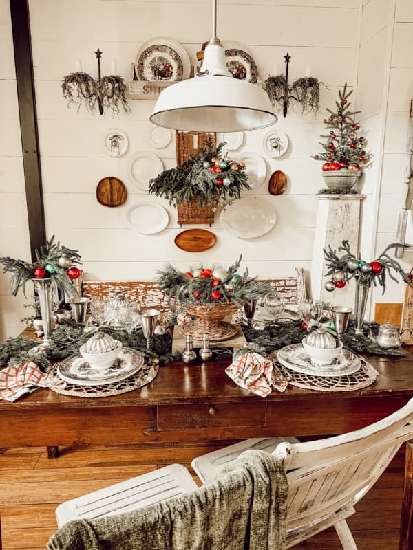 Farmhouse Christmas Tablescape with vintage glass ornaments for a retro holiday feel.