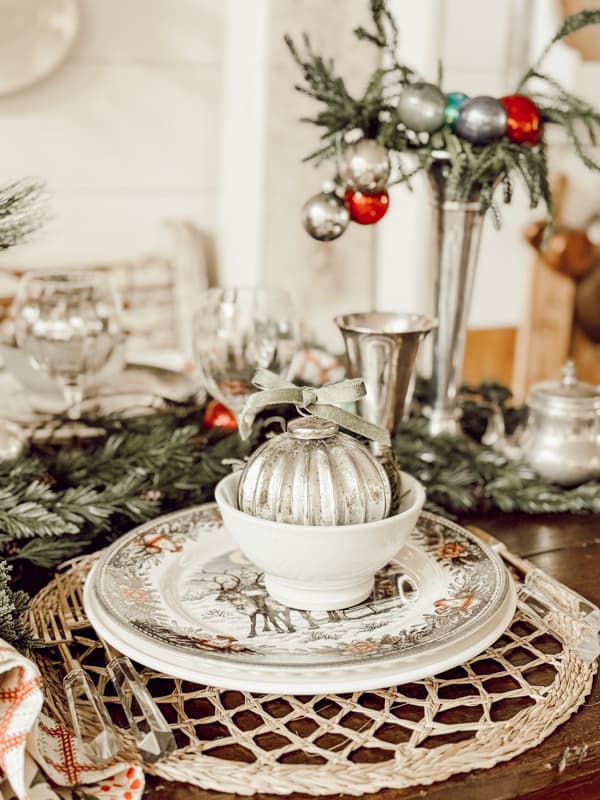 Retro Christmas Decorations for Dining Table with silver fluted vases and vintage tableware. 