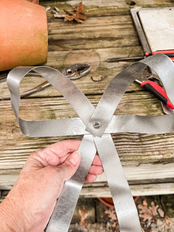  create a Christmas Tree bow with metal strapping.