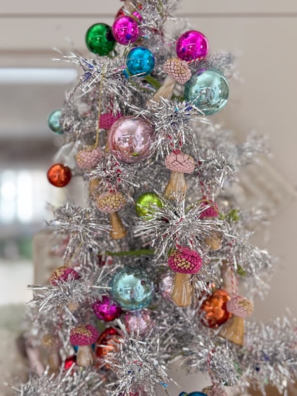 Mini Acorn Cap Mushroom Christmas Ornaments on Silver Tinsel tree.