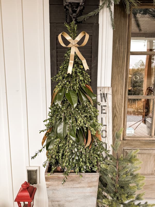 Christmas Greenery Trees for outdoor front porch decor.  