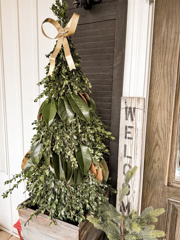 Christmas Greenery Trees in DIY planters for outdoor front porch decor 