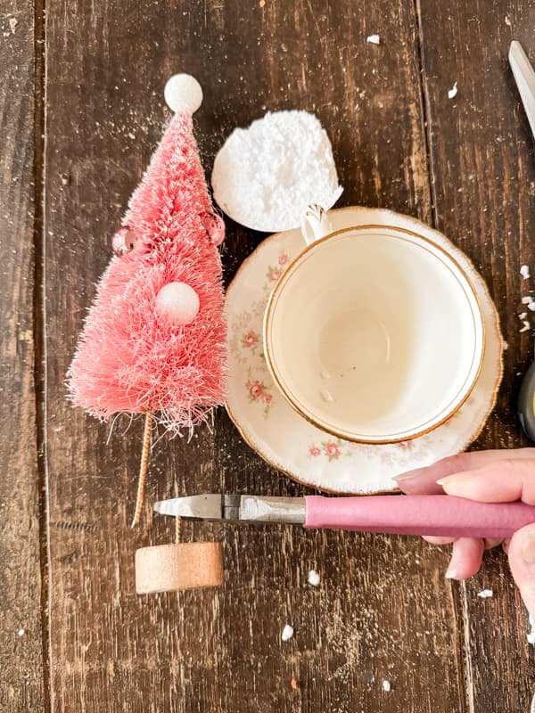 Add Dollar Tree Trees to vintage tea cup.  