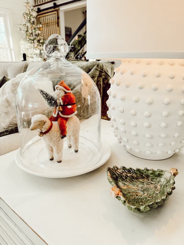 Vintage Christmas santa on a sheep under a glass cloche