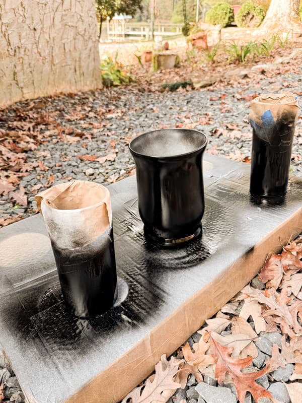 Spray paint Dollar Tree Vases with hammered paint.