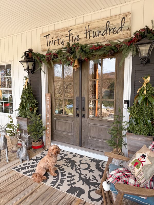 Rudy at the front doors with outdoor Christmas Decoration ideas.  