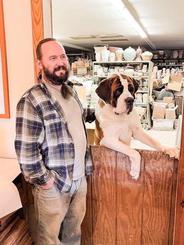 Dirt Work Pottery with owner and St. Bernard.  