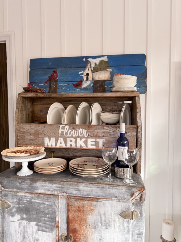 Vintage Metal Ice box with olf wooden flower box serves as beverage and dessert station.