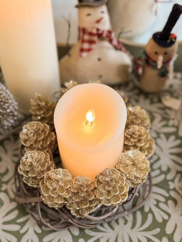 DIY Christmas Candle Ring with gold pinecones and grapevine wreath