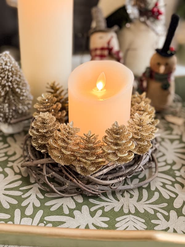 DIY Christmas Pinecone Candle Ring with flicker candles.  