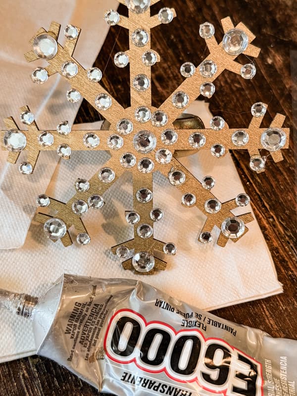 Attach rhinestones with E-6000 glue if they are not secure.