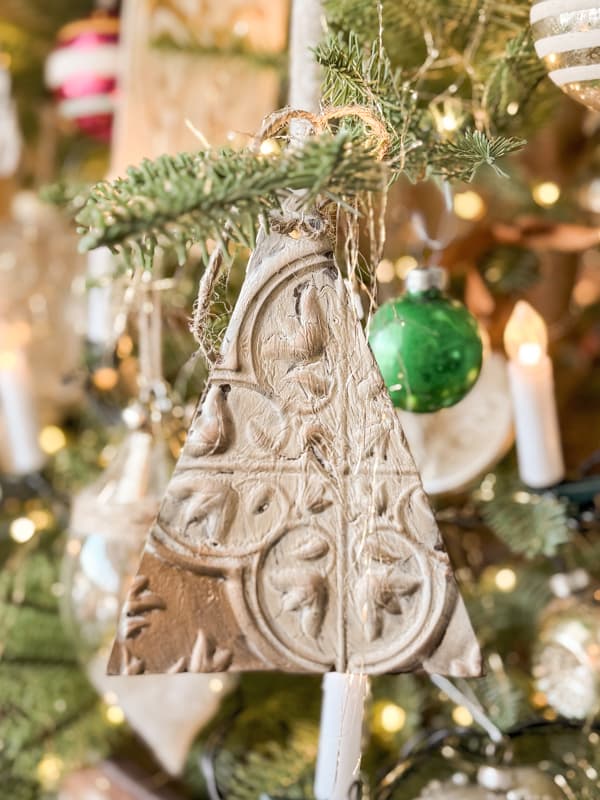 DIY Vintage Metal Christmas Ornaments made with Dollar Tree Wall Tiles for $1.25