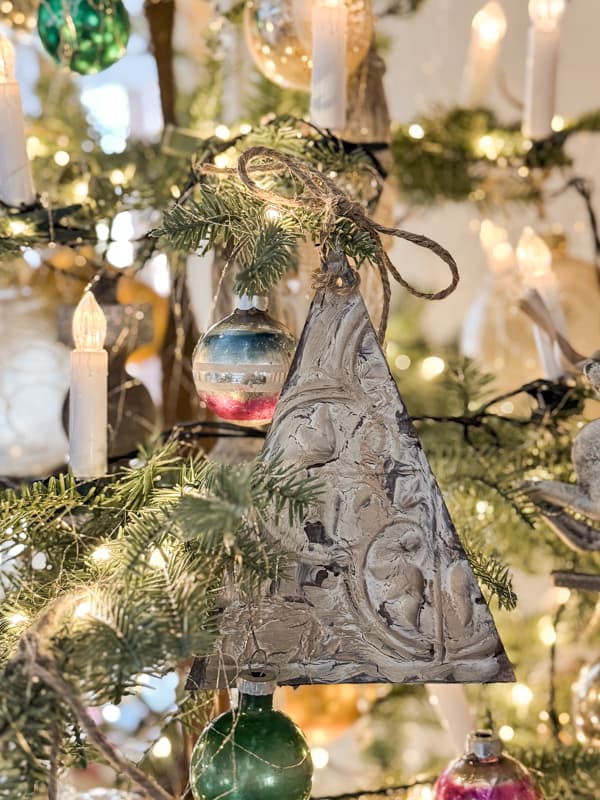 DIY Vintage Metal Christmas Ornaments made with Dollar Tree Wall Tiles for $1.25