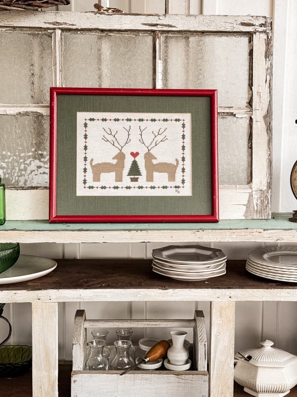 Reindeer Crossstitch framed thrift store art for outdoor Christmas Decorating ideas.  