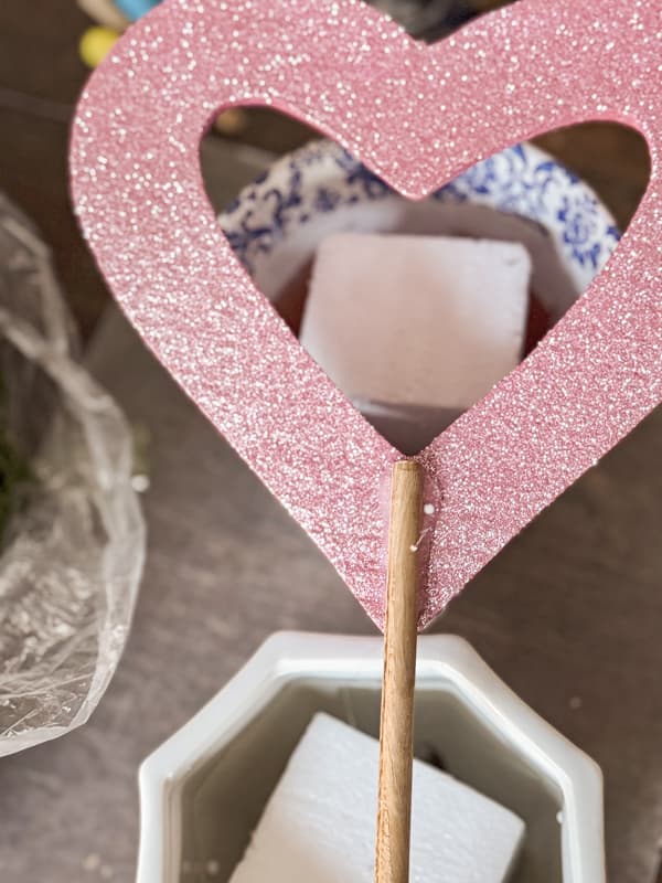 Add stem to styrofoam heart with hot glue.